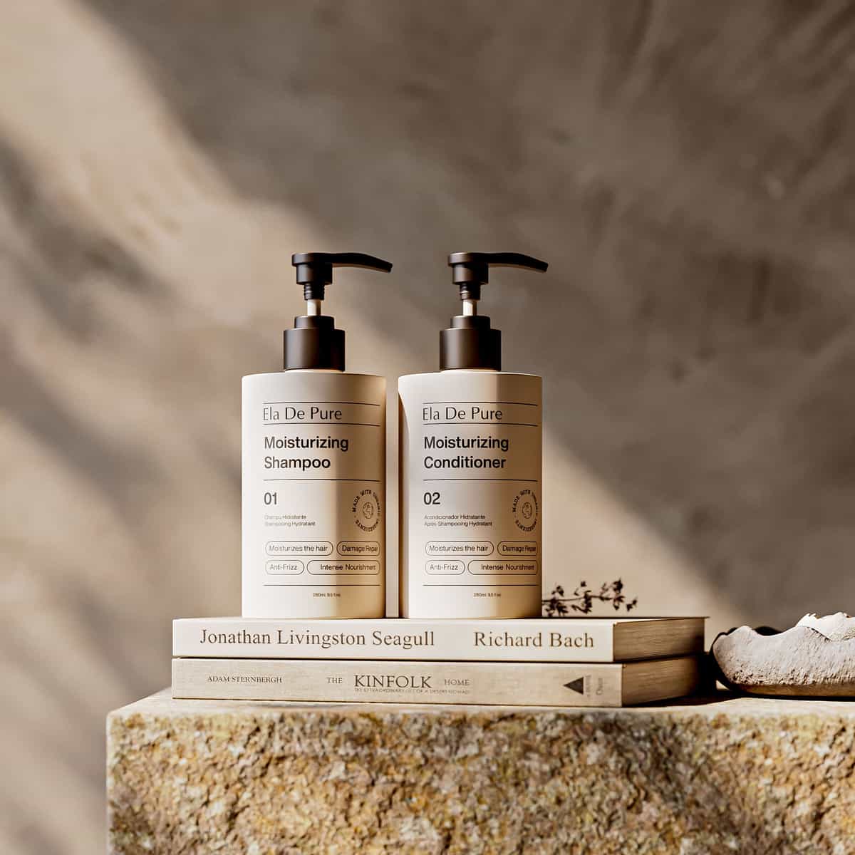 Cosmetic products arranged in a simple display in neutral tones